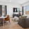 Stylish living room with comfortable seating, decor, and natural light
