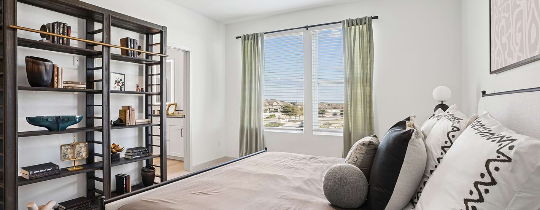 A bedroom with modern furnishings designed to suit any lifestyle