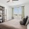 A bedroom with modern furnishings designed to suit any lifestyle